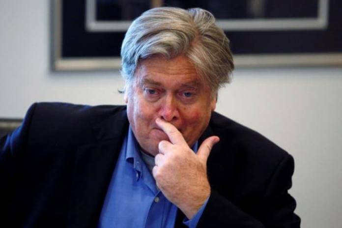 Campaign CEO Stephen Bannon listens during Republican presidential nominee Donald Trump's round table discussion on security at Trump Tower in the Manhattan borough of New York